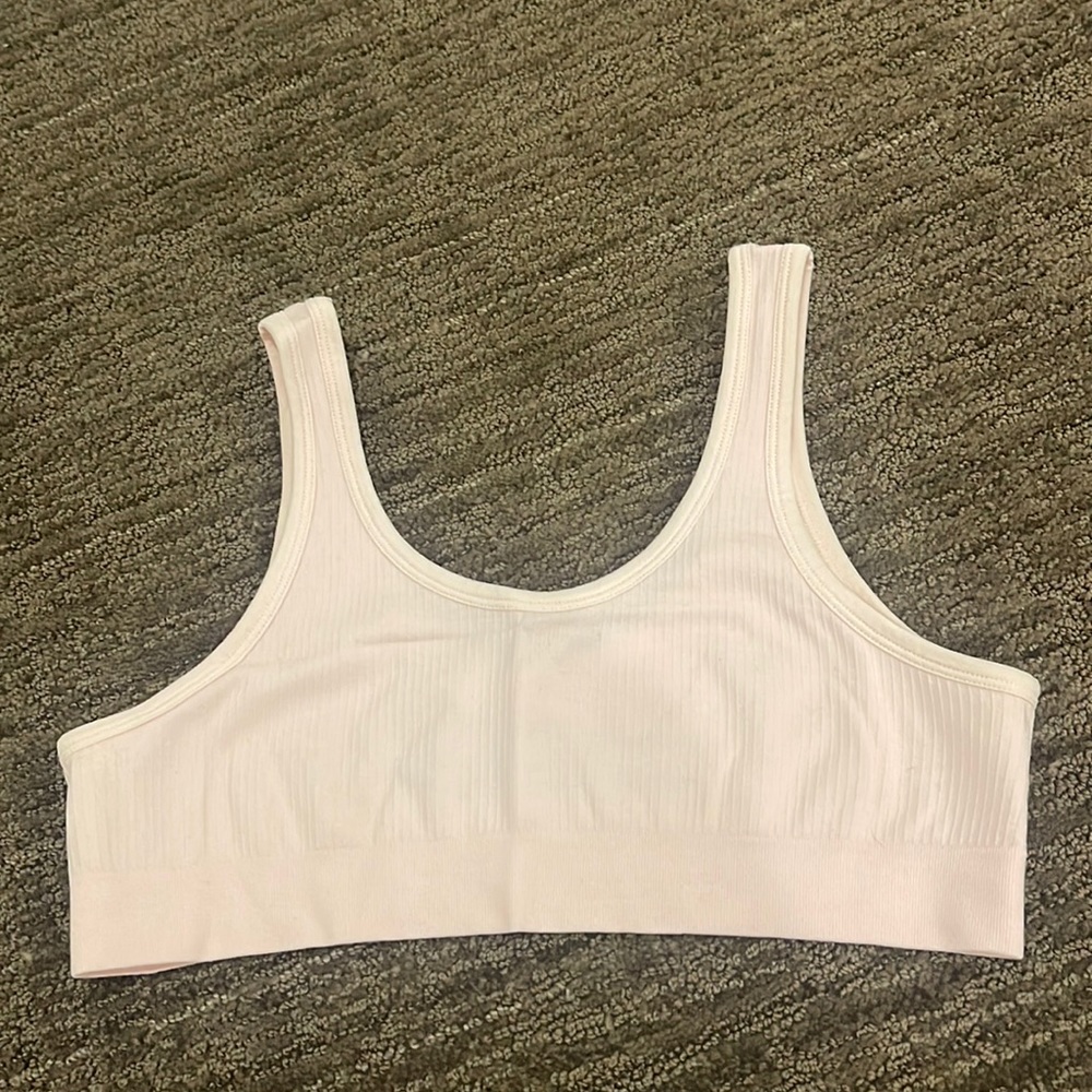Light pink target sports bra. Kids size xl. Fits woman’s small
